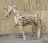 Product image 3 of the product “Horse in one piece, the head is from one piece of wood and carved head. The size is sbout 240cm lenght and 165cm height. ”